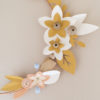 détail couronne de fleurs millimétre poudre origami pliage main